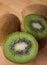 Kiwis on a wooden board