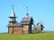 Kizhi, Karelia, Russia. The chapel of the Archangel Michael, the mill and the Transfiguration Cathedral in the background