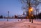 Klaipeda, Lithuania - 01 15 21: Old historical Neo-Gothic University building campus in winter snow, pink sunset colors