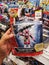 Klang, Malaysia - 20 September 2020 : Hand hold a packed of SABAN\'S Power Rangers Pink Ranger for sell in the supermarket