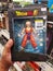 KLANG, MALAYSIA - 29 September 2020 : Hand hold a boxed set for sell of Dragon Ball Krillin Toy in the supermarket.