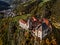 Klausen, Italy - Aerial view of the SÃ¤ben Abbey Monastero di Sabiona with Chiusa Klausen comune northeast of Bolzano