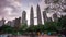 KLCC park petronas twin towers day panorama 4k time lapse kuala lumpur malaisia