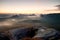 Kleiner Winterberg view. Fantastic dreamy sunrise on the top of the rocky mountain with the view into misty valley