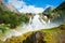 Kleivafossen waterfall near Briksdal glacier in Norway.