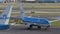 KLM Boeing 737 at Schiphol airport with many KLM