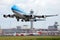 KLM Jumbo Boeing B747 plane taking off from Amsterdam Airport Schiphol AMS