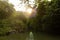 Klong Thom hot spring waterwall in dark river