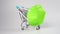 KN95 colorful green medical mask on a shopping cart