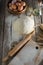 Kneaded dough, ears of wheat,rolling pin, eggs and a bottle of oil on the old rustic table