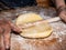 Kneading the sweet pizza manually is Italian peasant tradition with ancient and healthy method