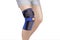 Knee Support Brace on leg isolated on white background. Orthopedic Anatomic Orthosis. Braces for knee fixation, injuries and pain.