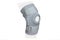 Knee Support Brace on leg isolated on white background. Orthopedic Anatomic Orthosis. Braces for knee fixation, injuries and pain.