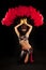 Kneeling Belly Dancer with Feather Fan