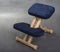 Kneeling chair for healthy sitting. Knee chair support your back