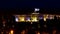 Knesset with flying waving flag of Israel at night