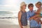 We knew youd love the beach. a young family enjoying a summer day out at the beach.