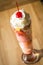 Knickerbocker glory Ice cream sundae with fruit and whipped cream