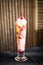 Knickerbocker glory Ice cream sundae with fruit and whipped cream