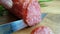 The knife cuts salami sausage ingredient delicious spanish homemade gourmet