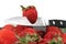 Knife cutting strawberry