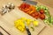 Knife laying on top of a freshly diced yellow bell pepper