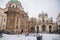 Knight of the Cross Square near Charles Bridge under snow in winter day, Baroque Church of St. Francis of Assisi and Church of the