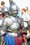 Knight in a helmet and armor at the historical reconstruction of the