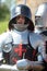 Knight in a helmet and armor at the historical reconstruction of the