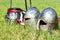 Knight`s helmets on the grass closeup. Historical and medieval concept