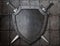 Knight shield and two swords over armor plates