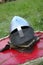 Knightly helmet lying on a board