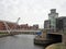 Knights bridge crossing the river aire and canal in leeds with waterside apartments and the royal armouries museum next to the