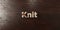Knit - grungy wooden headline on Maple - 3D rendered royalty free stock image