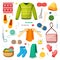 Knits and knitting set. Handicrafts green sweater with red mittens woolen threads knitting needles warm blue socks with