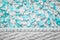 Knitted background with white and aquamarine threads