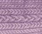 knitted backgroung. purple lavender texture. knitting pattern of wool. cable element