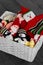 Knitted christmas toys and decorations in a basket