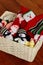 Knitted christmas toys and decorations in a basket