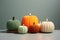 Knitted Colorful Pumpkins And Candles, Representing Thanksgiving Home Decor Concept