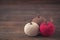 Knitted, crocheted apples on wooden background