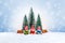 Knitted dolls with bells in colorful sweaters with fir trees and Christmas presents