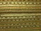 Knitted fabric texture. Background image. Hobbies, leisure, crafts. Horizontal arrangement of the pattern. Green and brown