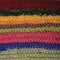 Knitted fine wool garment colorful stripes background natural texture, yellow, beige, claret, pink, blue green scarf macro closeup