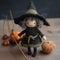 A knitted handmade cute witch