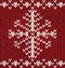 Knitted New Year pattern with xmas snowflake