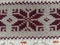 Knitted patterns with snowflakes, deer, flowers, broken stripes. Orange, red brown, white, beige woolen threads. Folk art. Warm