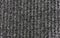 Knitted plaid blanket black grey melange texture background