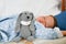 Knitted rabbit protects the little boy\\\'s sleep