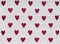 Knitted white background with red hearts pattern
